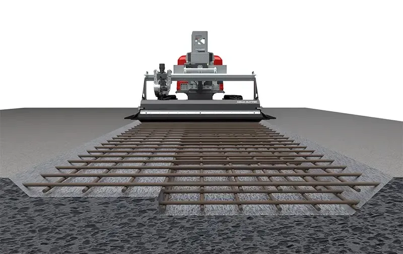 Teknisk visualisering af en Aquacutter-robot der nedbryder beton og blotlægger armeringsnettet under.